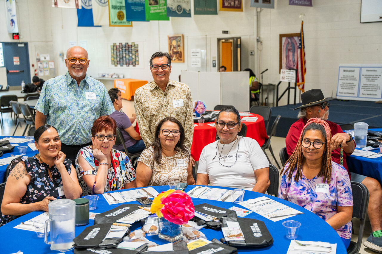 A group of volunteers poses at the luncheon.
